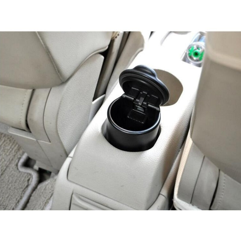 Cenicero portátil para coche con luz LED azul, sin humo, con soporte para cigarrillos y botón de goma antideslizante.