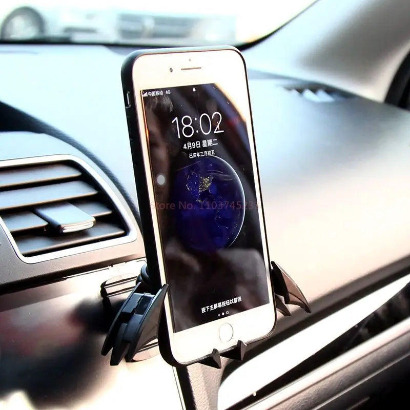 Nuevo soporte para teléfono de coche con hebilla de gravedad de Batman, con salida de aire y navegación, apto para dispositivos de 4 a 6,5 pulgadas.