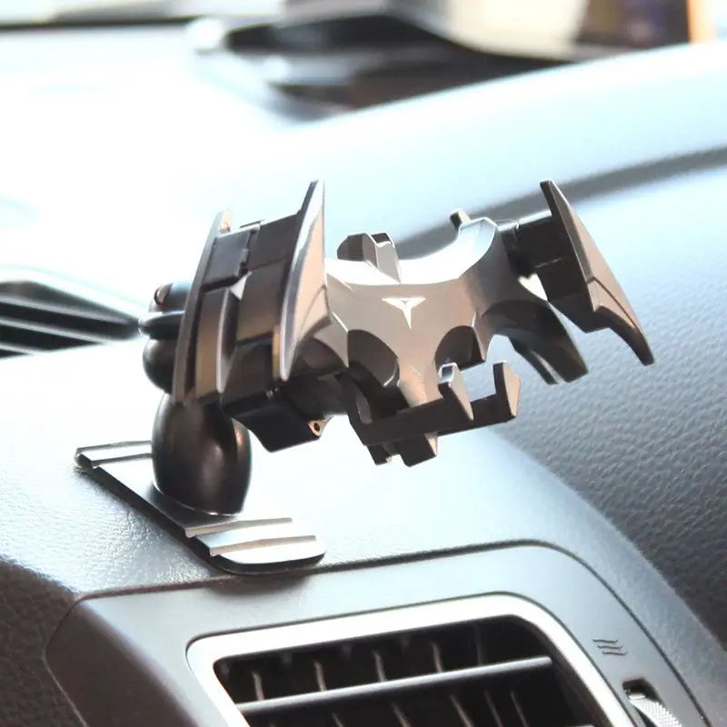 Nuevo soporte para teléfono de coche con hebilla de gravedad de Batman, con salida de aire y navegación, apto para dispositivos de 4 a 6,5 pulgadas.