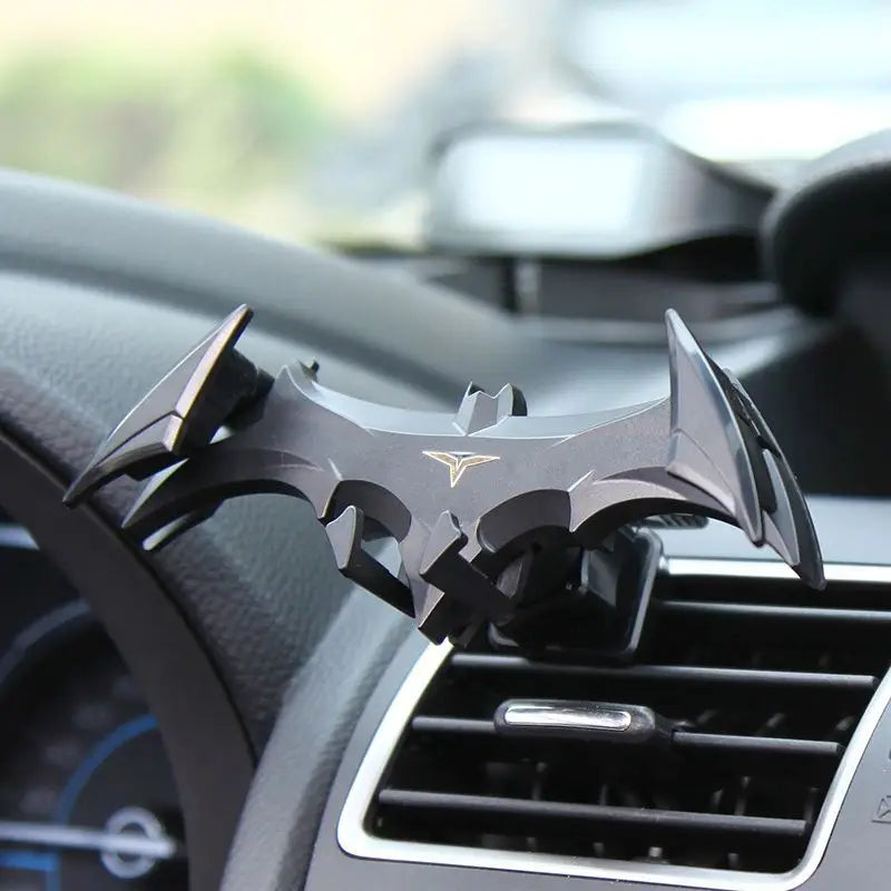Nuevo soporte para teléfono de coche con hebilla de gravedad de Batman, con salida de aire y navegación, apto para dispositivos de 4 a 6,5 pulgadas.